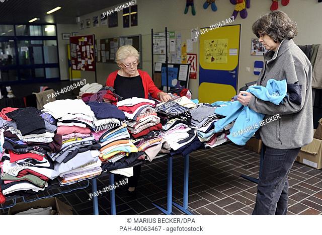 Clothing donations for flood victims are being prepared for collection in a local school in Deggendorf, Germany, 7 June 2013