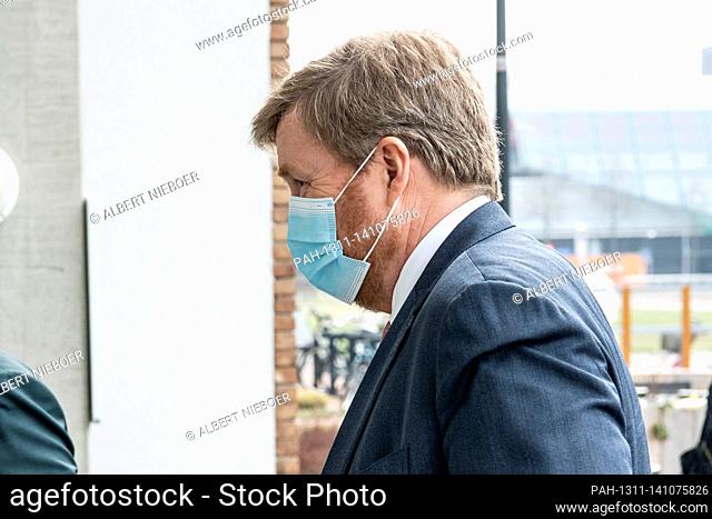 King Willem-Alexander of The Netherlands arrives at Verpleeghuis Hanzeborg in Lelystad, on March 25, 2021, for a workvisit to Woonzorg (residential care)...