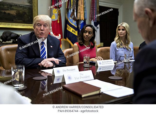 U.S. President Donald Trump speaks as U.S. Vice President Mike Pence, from right, Ivanka Trump, daughter of Trump, and Jessica Johnson