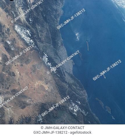 An oblique view of the Pacific Coast of Southern California, including the Los Angeles and San Diego areas, as seen from the Skylab space station in Earth orbit