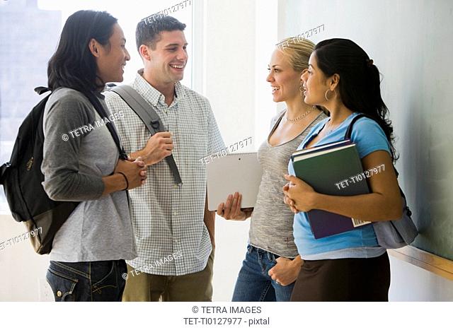 Multi-ethnic college students talking