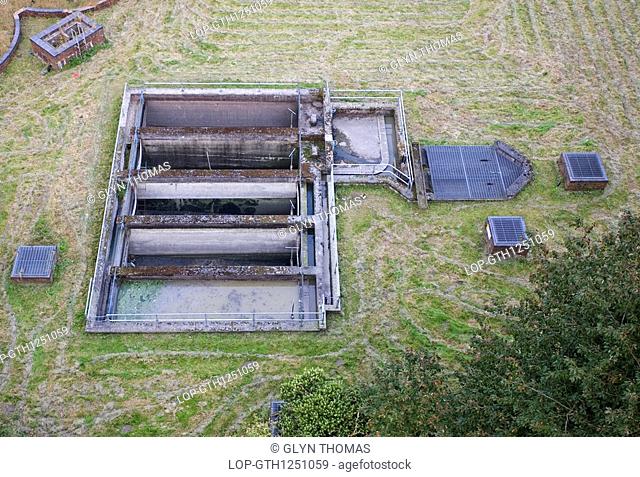 Wales, Wrexham, Pontcysyllte, Settling tanks at a sewage treatment works, viewed from the Pontcysyllte Aqueduct