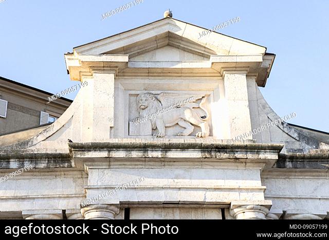 Detail of the upper part of the Porta San Giacomo in pinkish white marble, the most monumental of the four entrance doors from the Venetian walls to the upper...