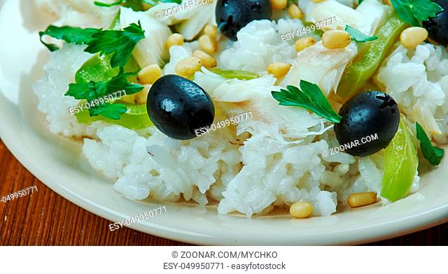 Smoked Haddock Risotto with olives and pine nuts, Mediterranean cuisine