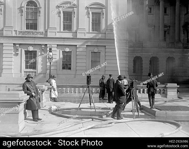 U.S. Capitol - Cleaning Exterior, 1913. Creator: Harris & Ewing