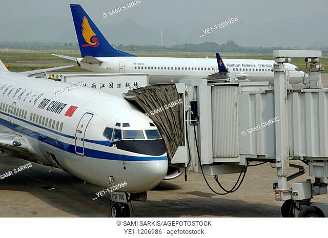 Aeroplane being prepared for takeoff at Guilin Liangjiang International Airport, Guilin, Guangxi, China