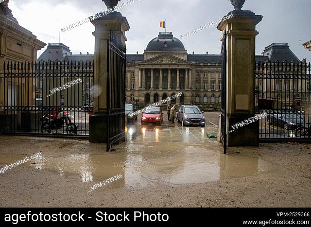 Illustration picture shows large puddles during heavy rainfall, across the Belgian royal palace, in Brussels, Sunday 16 August 2020
