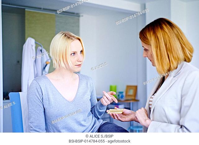 Doctor discussing oral contraception with a patient
