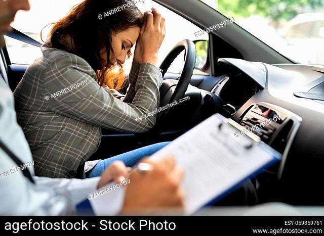 Driving License Test Failure. Sad Woman In Car