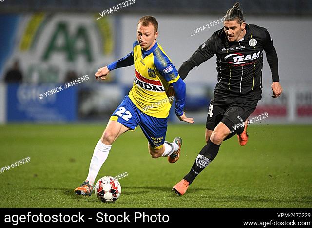 Westerlo's Christian Bruls and Lokeren's Seth De Witte fight for the ball during a soccer game between KVC Westerlo and Sporting Lokeren