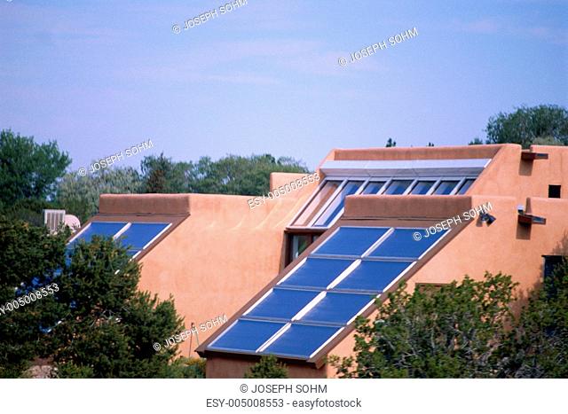 Adobe home with solar panels