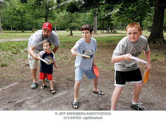 Newport News Park, disc golf, boy, father, aim, game, sport. Virginia. USA
