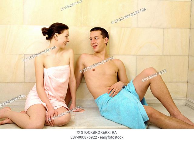 Image of happy couple resting after taking bath