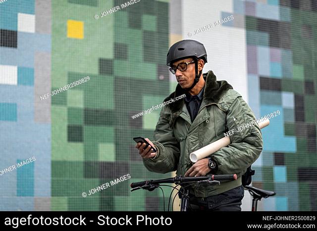 Bicycle courier using cell phone