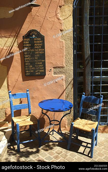 Traditional table and chairs of a cafe at the city center of Chania, Chania Province, Crete, Greek Islands, Greece, Europe