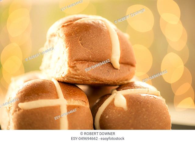 Tasty traditional Easter hot cross buns, closeup view