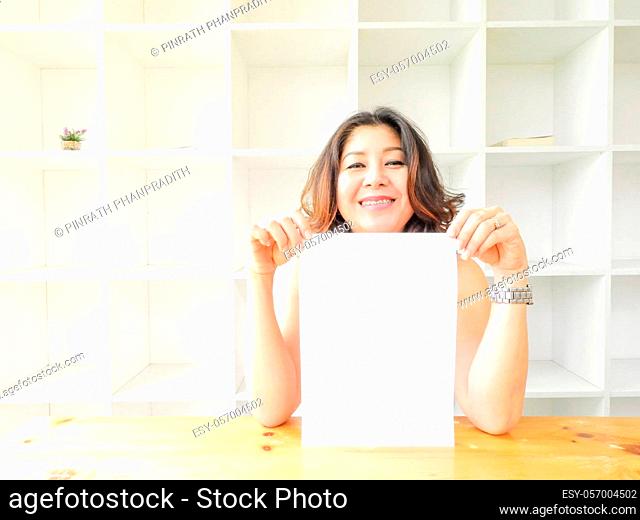 Beautiful woman smiling happy against white background.