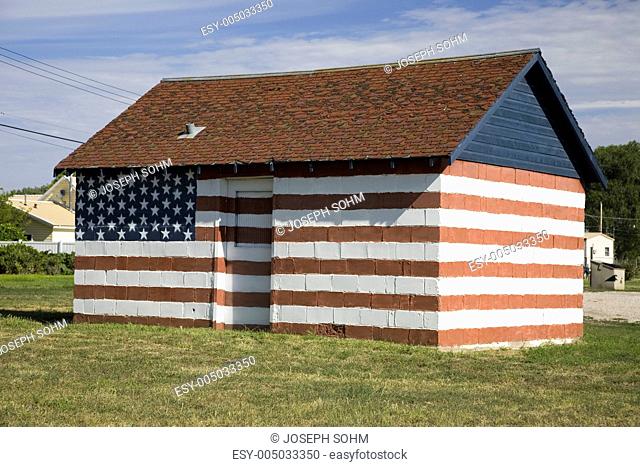Building with mural painting of the American flag along old Lincoln Highway, US 30, Ogallala, Nebraska