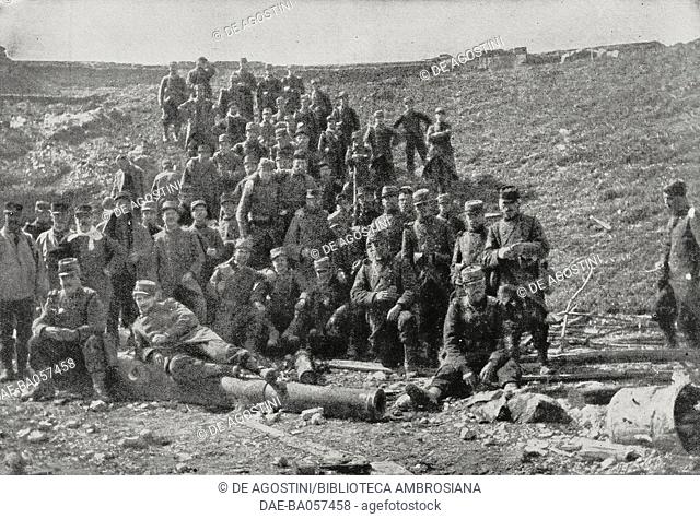 A group of French soldiers at the ruins of the fort of Troyon, France, First World War, photograph from the magazine L'Illustration, year 73, no 3749, January 9