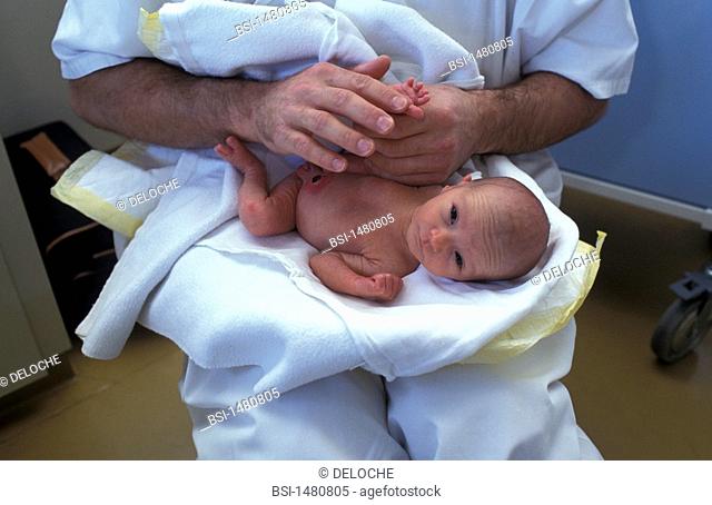 INFANT IN PHYSICAL THERAPY<BR>Massaging a premature baby at the Paul Brousse hospital in Villejuif, France