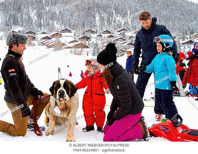 Crown Princess Mary, Crown Prince Frederik, Princess Josephine (L) and Princess Isabella of Denmark pose for the media during their winter holiday in Verbier