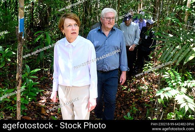 18 February 2023, Malaysia, Kuching: German President Frank-Walter Steinmeier (M-l) and his wife Elke Büdenbender are guided through a jungle in Kuching Wetland...