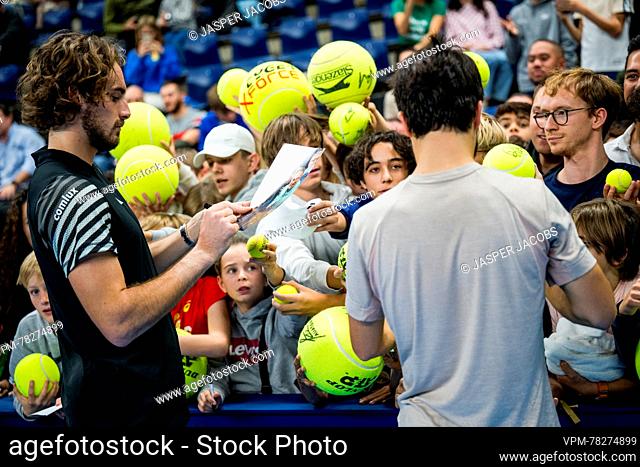 Greek Stefanos Tsitsipas and Greek Petros Tsitsipas celebrate with fans after the doubles final match between the brothers Tsitsipas and Urugayan-Czech couple...