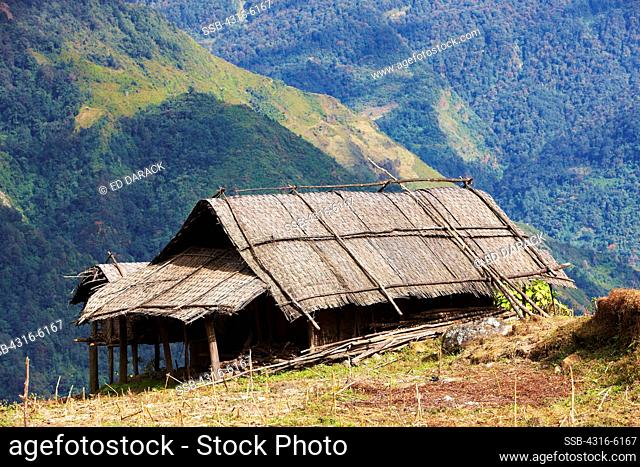 Nepal, Makalu-Barun National Park, Tashigon Village, View of Thatch roof farm house