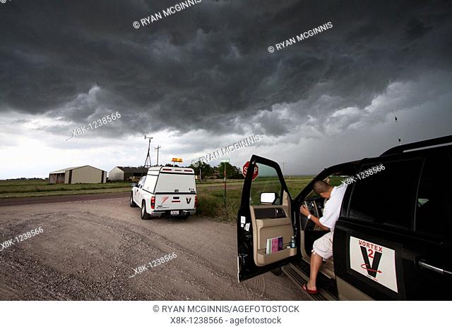 Storm chasers with Project Vortex 2 investigate a storm near Scottsbluff, Nebraska, June 7, 2010  Vortex 2 is a two year science mission to study tornadoes