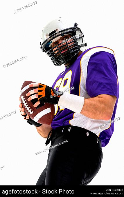 American Football Player posing in studio, isolated on white