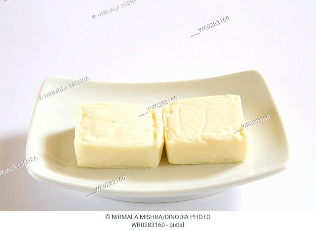 Cheese pressed into firm or hard mass home or dairy product