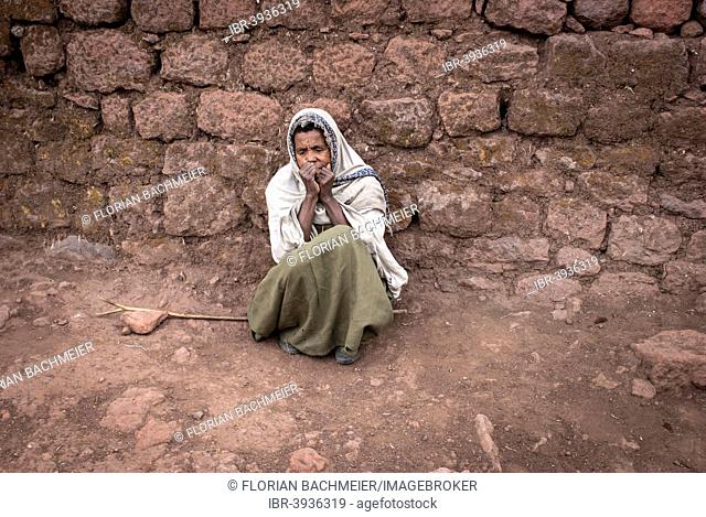 Woman begging for alms, Lalibela, Ethiopia
