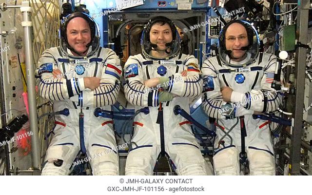 Russian cosmonaut Oleg Kononenko (center), Expedition 31 commander; along with European Space Agency astronaut Andre Kuipers (left) and NASA astronaut Don...