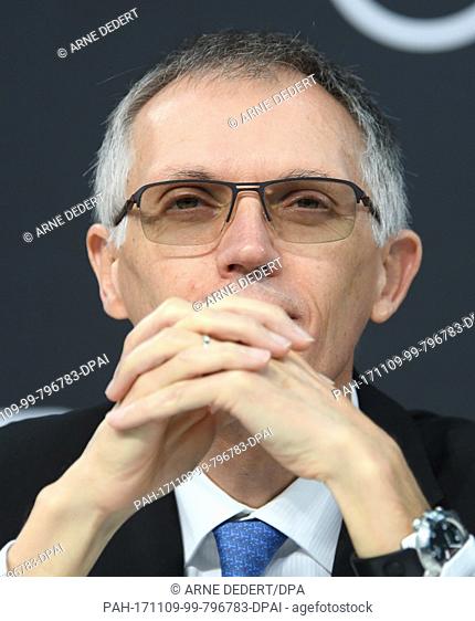 The chairman of PSA Peugeot Citroen Carlos Tavares looks on the crowd during the press conference at the Opel Design Centre in Ruesselsheim, Germany