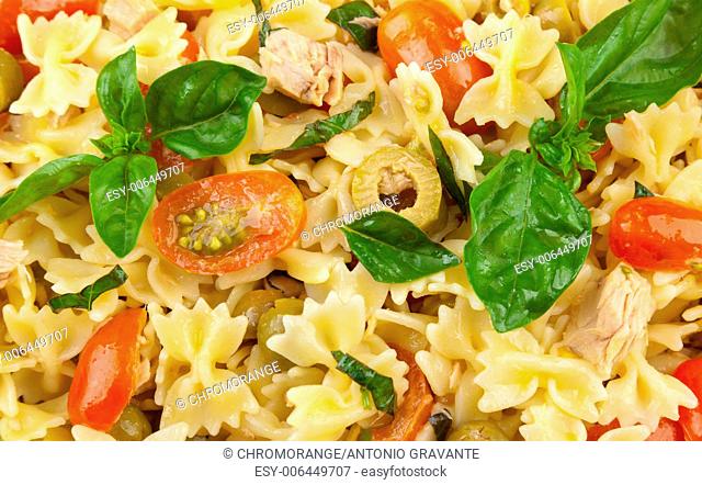 Pasta salad with tuna, cherry tomatoes and green olives