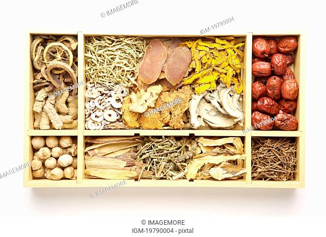 Chinese herbal medicines in box, still life