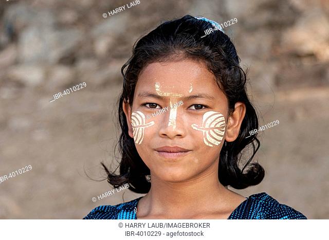 Burmese girl with Thanaka paste in the face, portrait, Myanamr