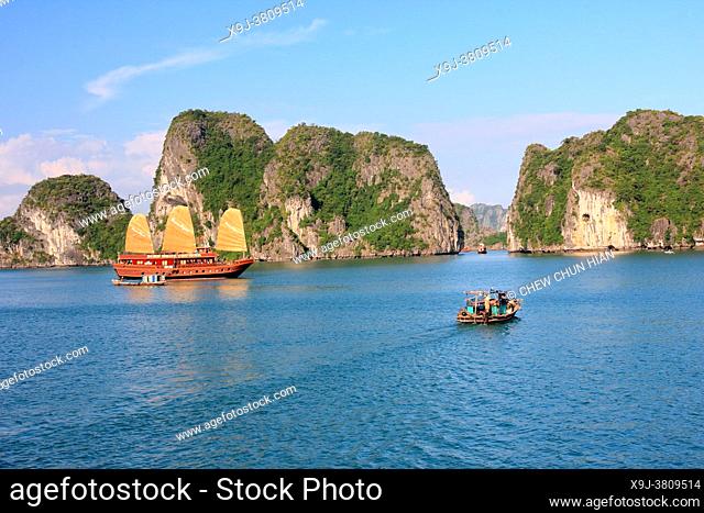 Boat and limestone karst in Ha long, Halong Bay, Vietnam, Ha long, Halong Bay, Vietnam