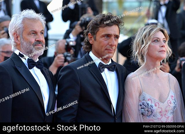 11 July 2021, France, Cannes: Margherita Buy (r-l), Adriano Giannini and Domenico Procacci attend the screening of the film ""Tre Piani"" during the 74th Annual...