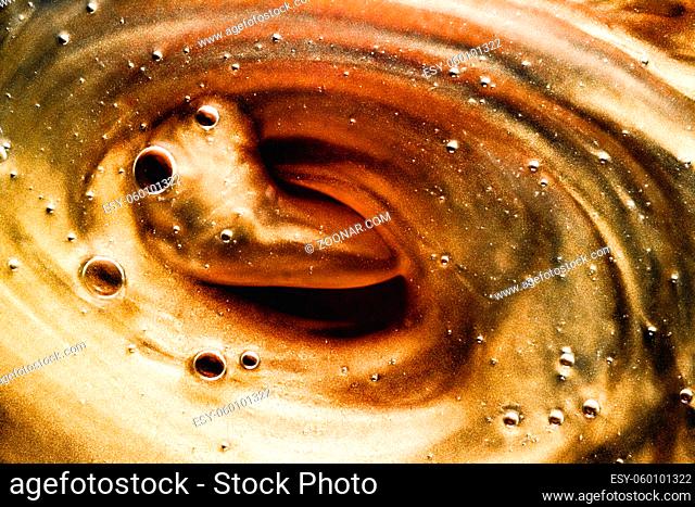Abstract bronze liquid background, paint splash, swirl pattern and water drops, beauty gel and cosmetic texture, contemporary magic art and science as luxury...
