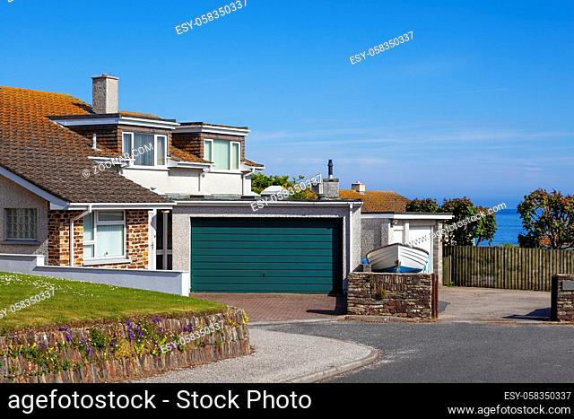 House by the sea with garage