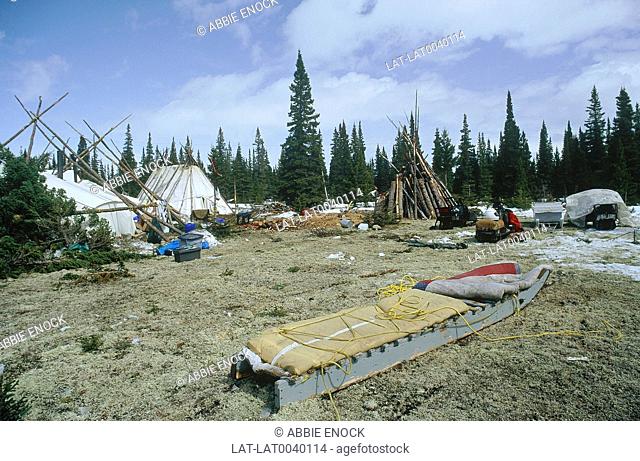 Cree is one of the largest group of indigenous peoples in North America, located mainly across Canada . there is a large camp of teepees or tents in Medeoewod...
