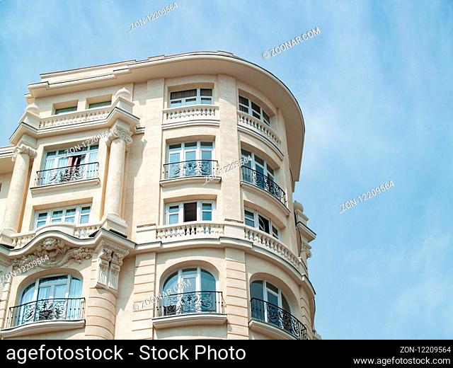 Residential building in a city. Antique and modern architecture
