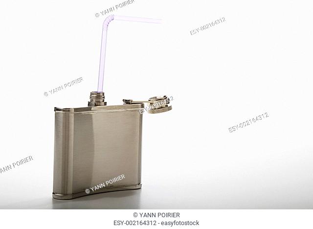 A flask and a straw