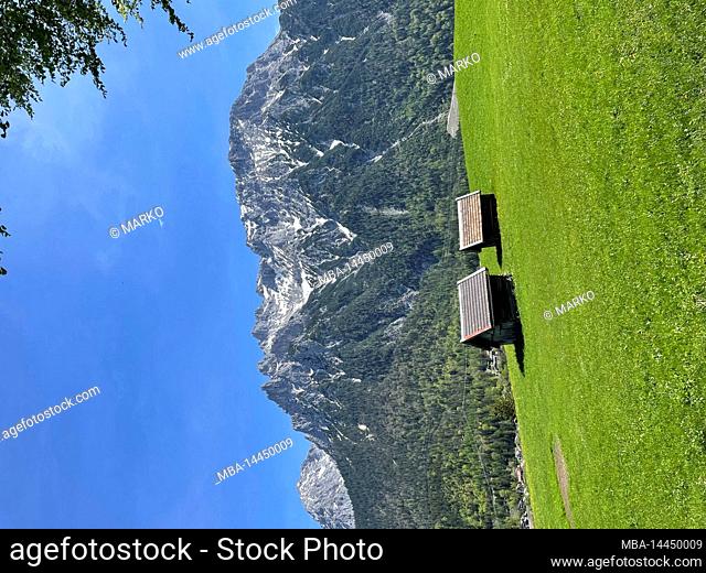 View of Karwendel massif above Mittenwald, hay barn, nature, mountains, meadows, activity, Alpenwelt Karwendel, Mittenwald, Upper Bavaria, Germany