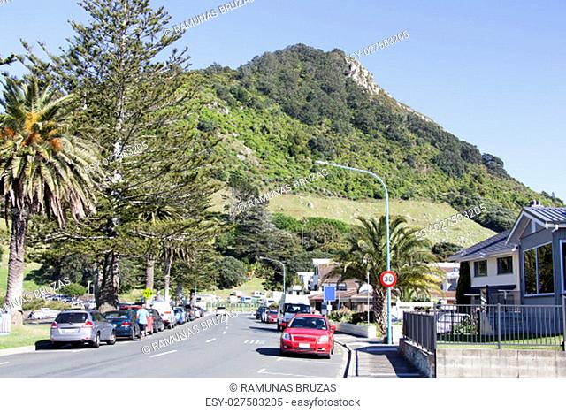 The morning view of The Mall street in Mount Maunganui resort town with Maunganui mountain in a background (Tauranga, New Zealand)