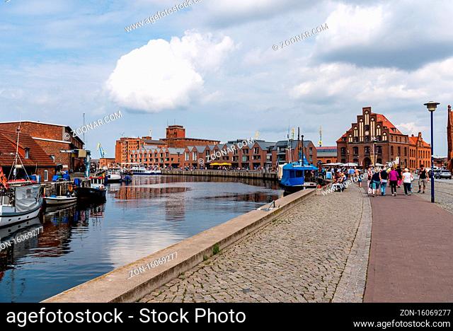 Wismar, Germany - August 2, 2019: The Old Hansa Harbor with boats selling fresh seafood. Wismar is a port and Hanseatic city in Northern Germany on the Baltic...