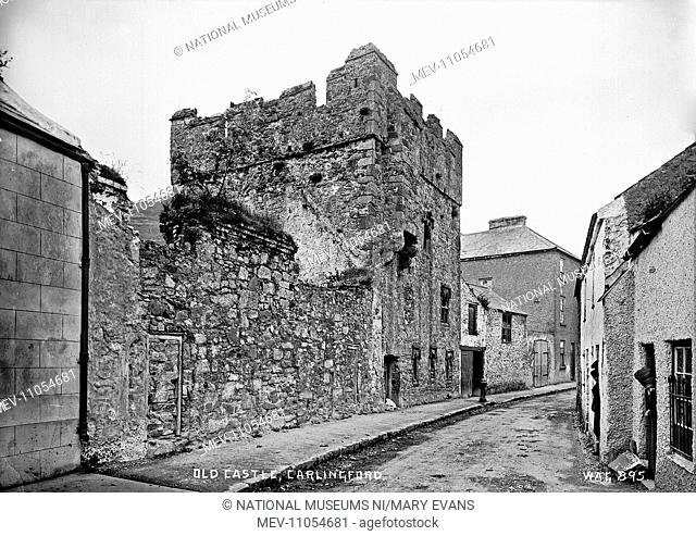 Old Castle, Carlingford - a view of a castle in a narrow street in the town. (Location: Republic of Ireland: County Louth: Carlingford)