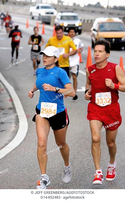 Florida, Miami Beach, Blue Cross and Blue Shield Tropical 5K Run, race, runner, sports, fitness, Hispanic, man, girl, teen, roadrace, competition, athlete