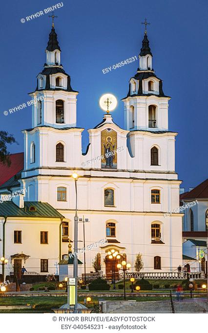 Moonrise of Full Moon over Cathedral Of Holy Spirit In Minsk. Famous and Main Orthodox Church Of Belarus in Minsk